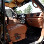 Xtreme Utility Vehicle with custom suede headliner interior, full interior color change to match the Bentley leather, leather convertible bed/bench