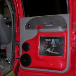 Inside door panel with television, red and gray